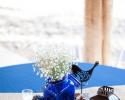 This lovely centerpiece with simple found objects like mason jars, laterns and re-purposed pine cones is truly one-of-a-kind! 