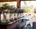 Find inspiration for your own wedding with everyday items like mason jars filled with baby's breath! 